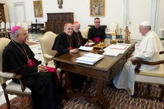 Pope Francis meets with officials representing the U.S. Conference of Catholic Bishops at the Vatican Sept. 13. Pictured from left are Archbishop Jose H. Gomez of Los Angeles, vice president of the conference, Cardinal Daniel N. DiNardo of Galveston-Houston, president of conference, Cardinal Sean P. O&#039;Malley of Boston, president of the Pontifical Commission for the Protection of Minors, and Msgr. J. Brian Bransfield, general secretary of the conference. 