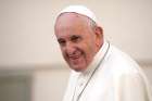 Pope Francis smiles as he arrives to lead his general audience in St. Peter&#039;s Square at the Vatican Nov. 6, 2019.