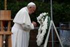 Pope Francis prays as he visits the Atomic Bomb Hypocenter Park in Nagasaki, Japan, Nov. 24, 2019.