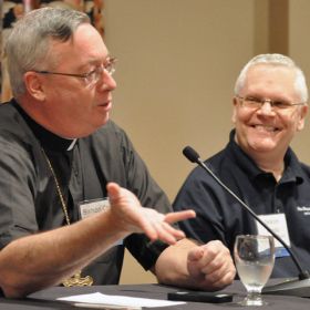 Bishop Christopher J. Coyne, apostolic administrator of the Archdiocese of Indianapolis, speaks during a panel discussion on blogging June 22 in Indianapolis at the Catholic Media Conference. Also on the panel was Deacon Greg Kandra, who is executive edi tor of One, the magazine of the Catholic Near East Welfare Association, and also maintains his own blog, The Deacon&#039;s Bench.