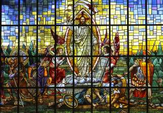 The stained-glass window depicting Christ&#039;s resurrection from Our Lady of Perpetual Help Chapel in Atlanta. 
