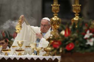Pope Francis uses incense as he celebrates Mass marking the feast of Mary, Mother of God, in St. Peter&#039;s Basilica at the Vatican Jan. 1.
