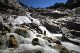 Water flows down the Trient Glacier in Trient, Switzerland, Aug. 26, 2019.