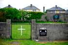 The entrance to the site of a burial site at the former Mother and Baby home in Tuam, County Galway, Ireland is seen in this 2014 file photo. The Mother and Baby Homes Commission of Investigation is probing how unmarried mothers and their babies were treated between 1922 and 1998 at 18 state-regulated institutions, many of them run by religious orders.