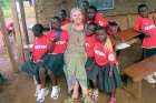 Catherine Koch with some of the children she helps in Uganda.