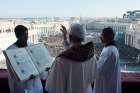 Pope Francis delivers his Christmas blessing &quot;urbi et orbi&quot; (to the city and the world) from the central balcony of St. Peter&#039;s Basilica at the Vatican Dec. 25. 