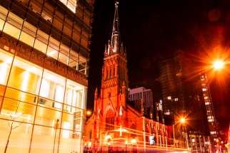 St. Michael&#039;s Cathedral in downtown Toronto lit up in red for the commemoration of Red Wednesday.