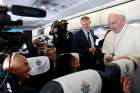 Pope Francis meeting journalists aboard his flight from Rome to Dublin Aug. 25