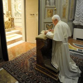 Pope Benedict XVI kneels in prayer Feb. 26 during his weeklong Lenten retreat in the Redemptoris Mater Chapel in the Apostolic Palace. Celebrating a morning Mass March 4 at the Church of St. John Baptist de la Salle in a Rome suburb and reciting the Angelus at midday with visitors at the Vatican, Pope Benedict commented on the day&#039;s Gospel account of the Transfiguration.