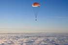 The Soyuz MS-06 capsule descends from the International Space Station before landing near Dzhezkazgan, Kazakhstan, Feb. 28. 