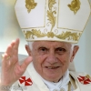 Pope Benedict XVI waves after celebrating an outdoor Mass in Zagreb&#039;s hippodrome June 5 during a two-day visit to the Croatian capital. About 400,000 people attended the Mass.