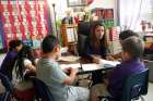 Teacher Maria Dominguez works with students at Rodriguez Elementary School in Austin, Texas. Dominguez said there is fear and anxiety among her students and their parents, many of whom are in the country illegally, over the Trump administration&#039;s immigration proposals.