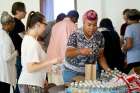 Parishioners at Holy Name of Jesus Church in Washington pack lunches for the poor June 25. More than 50 meals were distributed that day.