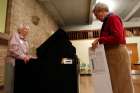 A Maryknoll sister casts her vote at a polling station inside her religious community&#039;s auditorium in 2010 in Ossining, N.Y.