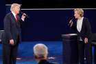 Republican U.S. presidential nominee Donald Trump and Democratic presidential nominee Hillary Clinton speak during their Oct. 9 presidential town hall debate at Washington University in St. Louis.