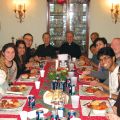 Youth and young adults share a meal at the rectory of St. Benedict’s parish for the very first gathering of Vocation in Progress.