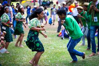 Indigenous World Youth Day pilgrims do a traditional dance during an opening-day performance in a Panama City park Jan. 22, 2019. 