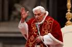 Pope Benedict XVI delivers a blessing at the conclusion of a Mass for the Knights of Malta in St. Peter&#039;s Basilica at the Vatican Feb. 9, 2013, two days before he announced his resignation. The retired pope marks his 92 birthday April 16. 