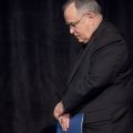 Philadelphia Archbishop Charles J. Chaput waits offstage as he is introduced as a speaker at the Catholic Media Conference in Indianapolis June 20. He told the gathering of the deep deficits and other challenges facing his archdiocese. The following day he announced a reorganization that will result in the loss of 40 jobs. The reorganization aims to save the archdiocese from a projected deficit of $17 million in the upcoming year.