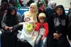 Syrian refugees wait at a clinic in 2016 at a camp near the Jordanian city of Mafraq. Many Syrian refugees are frustrated over President Donald Trump’s executive action banning their entry to the U.S. until further notice.