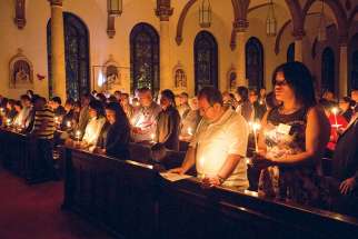 The light of Christ illuminates the darkness at the Easter Vigil in anticipation of a new dawn. 