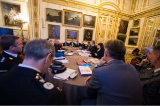 Delegates against human trafficking attend a conference at Lancaster House in London Dec. 6. Cardinal Vincent Nichols of Westminster said &quot;there seems to be no enticement that isn&#039;t being used&quot; by human traffickers to entrap children.