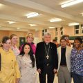 Cardinal Thomas Collins and young adults gather at a reception after the Office for Catholic Youth’s first Solemn Eucharistic Adoration with the Cardinal offered for youth and young adults on May 10.