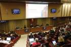 Journalists attend a press conference for the release of Pope Francis’ new encyclical, “Fratelli Tutti, on Fraternity and Social Friendship,” in the synod hall at the Vatican Oct. 4.