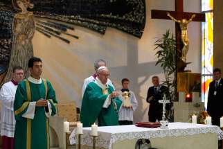 Pope Francis uses incense as he celebrates Mass at the Church of the Immaculate Conception in Baku, Azerbaijan, Oct. 2.