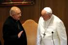 Pope Francis talks with Cardinal Pedro Barreto Jimeno of  Peru during a session of the Amazon synod.