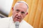 Pope Francis answers questions from journalists aboard his flight from Geneva to Rome June 21.