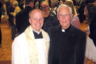 Fr. David Reitzel, left, is the latest in the Reitzel family to join the priesthood. He was ordained May 7 in Hamilton, Ont. He’s seen here with his uncle, Fr. Frank Reitzel. Two other Reitzel’s are also priests and another will be ordained next year. 