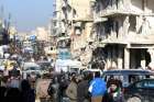 People seen Nov. 17, 2017 in Aleppo, Syria, after an airstrike. Christians who fled the city because of the civil war are now returning with the support of the local Church.