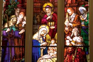 The nativity stained glass window at St. Michael’s Cathedral is more than a century old, but it has been cleaned, restored and practically reconstructed.