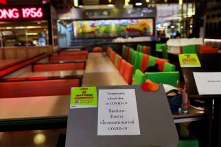 Closed restaurants are seen in a mall after the government shut down all the shopping centers in the country due to the coronavirus disease outbreak in Bangkok, Thailand, March 23, 2020. As more and more countries start to feel the economic pinch due to the coronavirus pandemic, Pope Francis urged business leaders to seek solutions that will not hurt employees and their families.