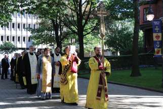 A procession begins the July 25 welcoming ceremony at the University of St. Michael’s College for the Sheptytsky Institute of Eastern Christian Studies.