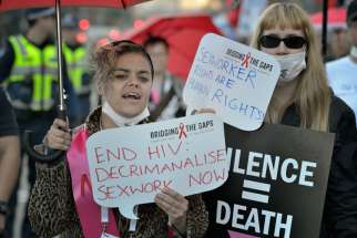 Sex workers and their supporters participate in a July 22 march demanding an end to stigma and discrimination against people living with HIV. The march, held during the the 20th International AIDS Conference in Melbourne, Australia, concluded with a cand lelight vigil in which participants remembered all who have died of HIV- and AIDS-related causes.