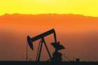 An oil well is seen near Ponca City, Okla. A new IPCC climate report reiterates that we need to end our dependency on fossil fuels. 