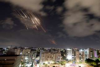 Israel’s multilayered air-defense system intercepts missiles after Iran fired a salvo of ballistic missiles, as seen from Ashkelon, Israel, Oct. 1. That evening Iran fired over 180 missiles toward Israel.