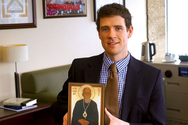 Andrew Bennett, Canada’s religious freedom ambassador, holds an icon of Blessed Vasyl Velichkovsky.