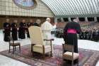 Pope Francis prays as he leads a June 23 audience at the Vatican with members of Serra International, which held its 75th international convention in Rome June 22-25. 