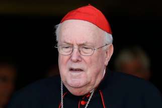 Cardinal Godfried Danneels, 85, retired archbishop of Mechelen-Brussels, Belgium, died March 14, 2019, in Mechelen. He is pictured leaving a session of the extraordinary Synod of Bishops on the family at the Vatican in this Oct. 9, 2014, file photo.