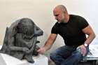 Timothy Schmalz works on the clay model for his bronze sculpture When I Was Naked.