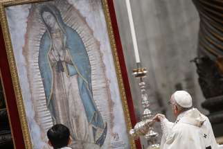 Pope Francis swings a censer in front of an image of Our Lady of Guadalupe as he celebrates Mass Dec. 12 marking her feast day in St. Peter&#039;s Basilica at the Vatican. 