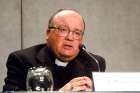 Archbishop Charles Scicluna of Malta speaks at a news conference May 9.