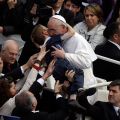 This photo by AP photographer Gregorio Borgia of Pope Francis embracing 8-year-old Dominic Gondreau, who has cerebral palsy, captured the attention of people around the world. The moment took place after the new pontiff celebrated his first Easter Mass i n St. Peter&#039;s Square at the Vatican March 31.