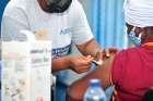 Catholic Relief Services staff deliver the Johnson &amp; Johnson COVID-19 vaccine during a vaccination exercise organized by CRS-Ghana.