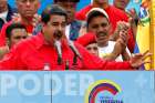 Venezuelan President Nicolas Maduro delivers a speech in Caracas during the closing campaign ceremony for the July 27 Constituent Assembly election. The banner reads &quot;Power&quot;.