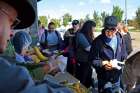 Inner City Pastoral Ministry volunteers serve lunch outside the Bissell Centre in downtown Edmonton. 