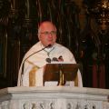 Archbishop Terrence Prendergast holds his iPhone while explaining the importance of unplugging and being still. 